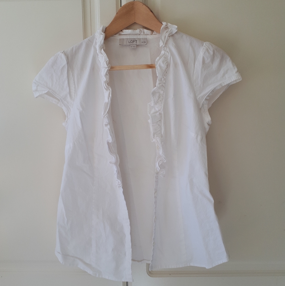 White ruffle blouse
